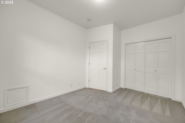 2915 Chandler Ave, Eugene, OR 97403 - unfurnished bedroom with carpet floors and a closet