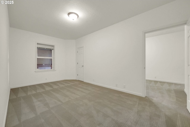 2915 Chandler Ave, Eugene, OR 97403 - carpeted spare room featuring baseboards and a textured ceiling