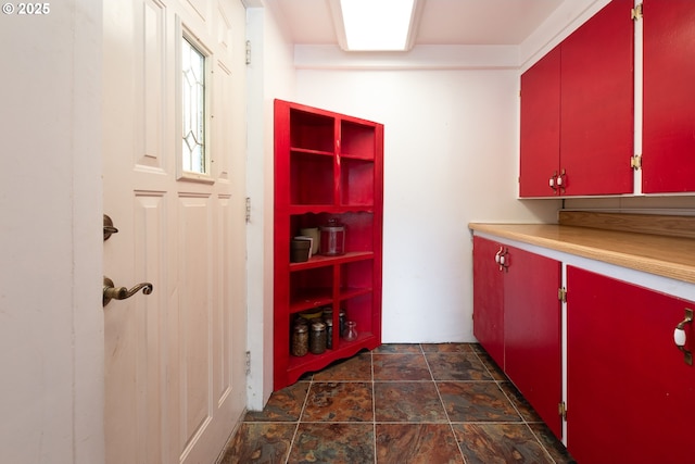 interior space featuring stone finish floor