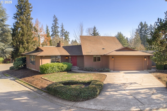 ranch-style home with a garage