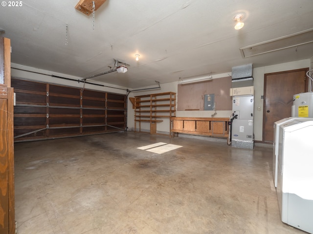 garage featuring heating unit, washer / dryer, electric panel, a garage door opener, and electric water heater