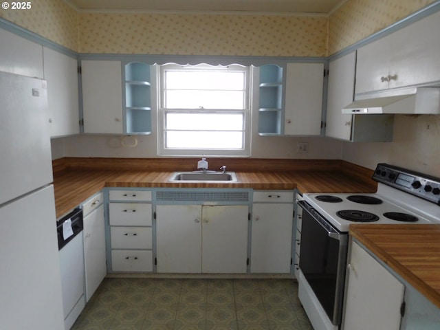 kitchen featuring white cabinetry, sink, white appliances, and wood counters