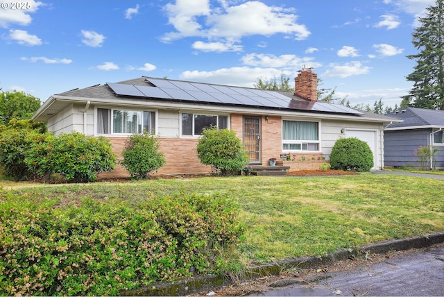 2235 SE 185th Ave, Portland, OR 97233 - ranch-style home featuring a garage, a chimney, a front lawn, and roof mounted solar panels