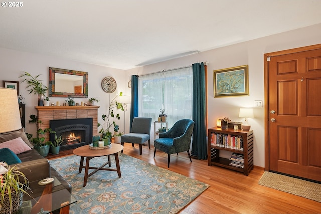 2235 SE 185th Ave, Portland, OR 97233 - living area with light wood-style floors and a fireplace