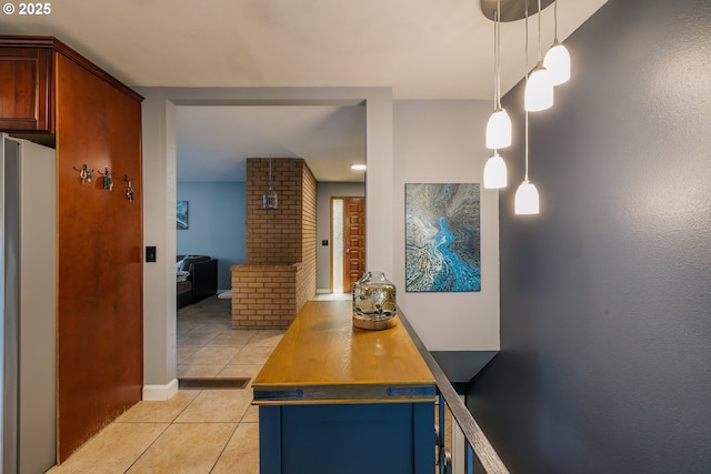 hall with light tile patterned flooring