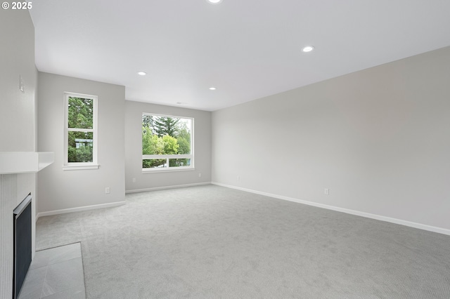 4636 SE 2nd St, Gresham, OR 97080 - unfurnished living room featuring carpet, recessed lighting, and a fireplace with flush hearth