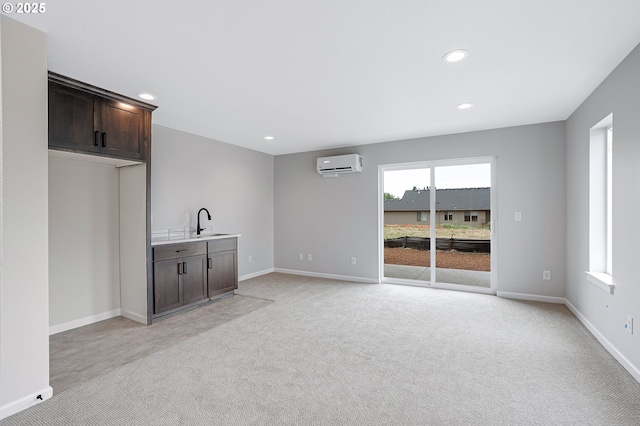 4636 SE 2nd St, Gresham, OR 97080 - unfurnished living room featuring a wall mounted air conditioner, light colored carpet, and recessed lighting
