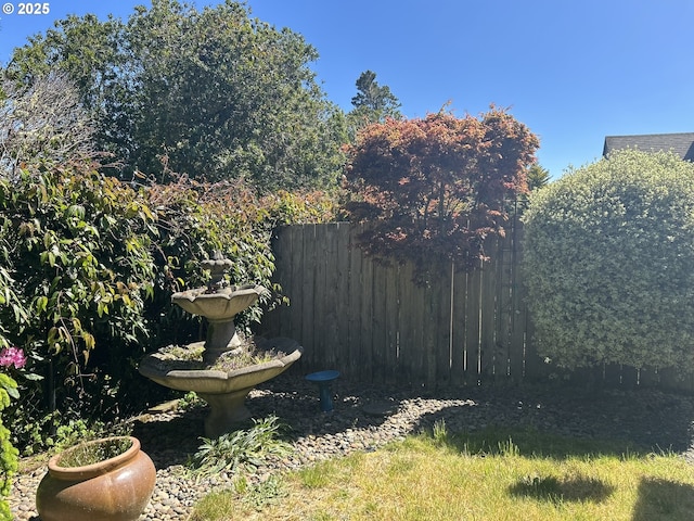 view of yard with fence