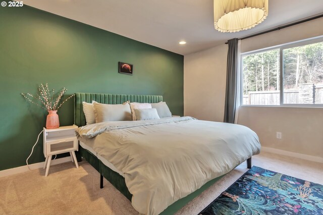 carpeted bedroom with recessed lighting and baseboards