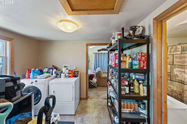 458 16th Ave, Coos Bay, OR 97420 - laundry room featuring washer and clothes dryer, a textured ceiling, and attic access