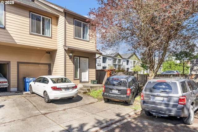 2833 NE Stapleton Rd, Vancouver, WA 98661 - multi unit property featuring a garage, fence, and concrete driveway