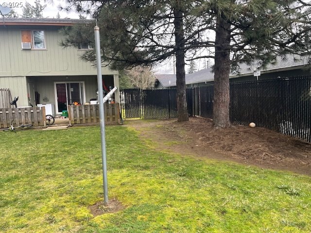 view of yard with a fenced backyard