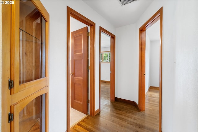 1897 Chelan St, Keizer, OR 97303 - hall with light wood-type flooring and baseboards