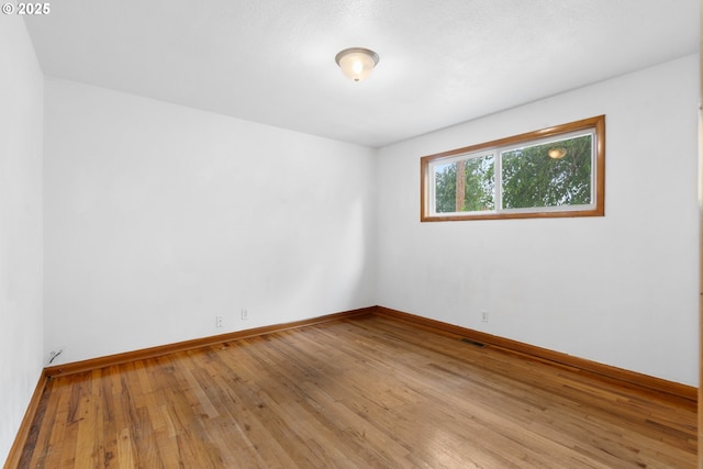 1897 Chelan St, Keizer, OR 97303 - spare room with wood finished floors and baseboards