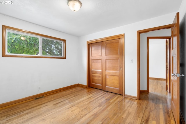 1897 Chelan St, Keizer, OR 97303 - unfurnished bedroom featuring light wood-style floors, baseboards, and a closet