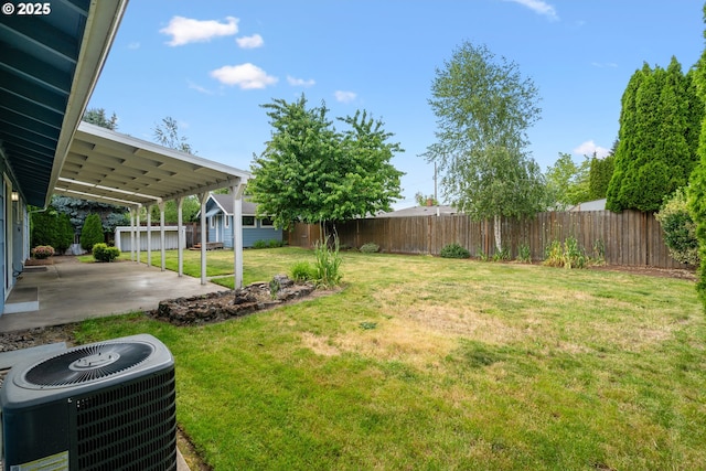 1897 Chelan St, Keizer, OR 97303 - view of yard featuring central air condition unit, a patio, and an outbuilding