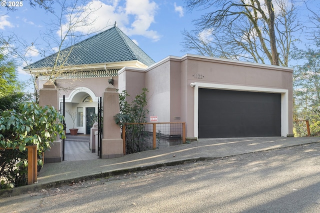 view of front of home with a garage