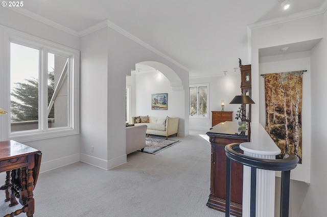 hall featuring crown molding and light colored carpet