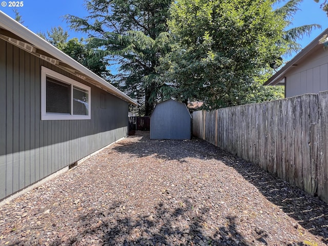 2380 NE Rene Ave, Gresham, OR 97030 - fenced backyard featuring a storage unit