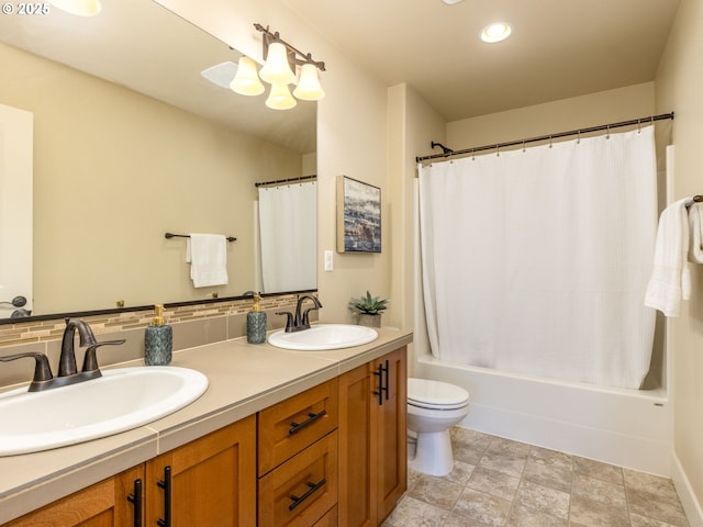 14420 SW Equestrian Ln, Beaverton, OR 97008 - full bathroom featuring double vanity, toilet, shower / tub combo, recessed lighting, and decorative backsplash