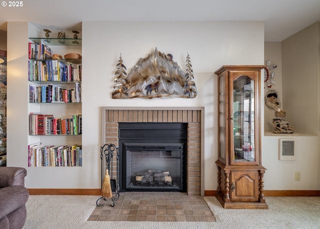 1 3rd St, Astoria, OR 97103 - detailed view of a brick fireplace, heating unit, and carpet