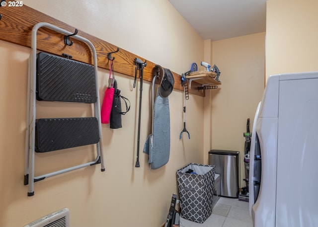 1 3rd St, Astoria, OR 97103 - spacious closet featuring washer / dryer and tile patterned flooring