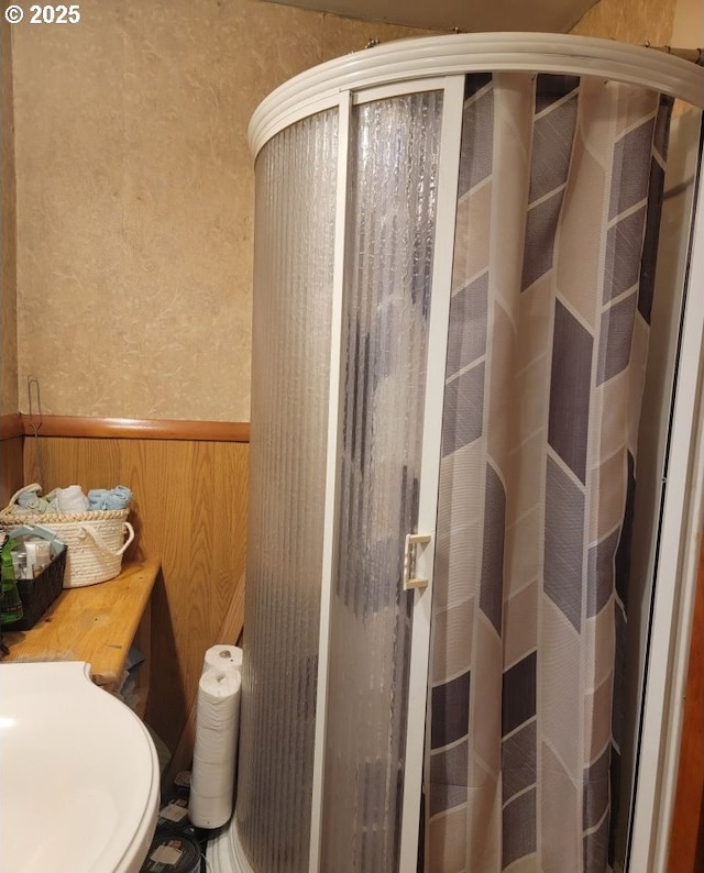 309 A Ave, Seneca, OR 97873 - full bathroom featuring a wainscoted wall and a shower with shower curtain