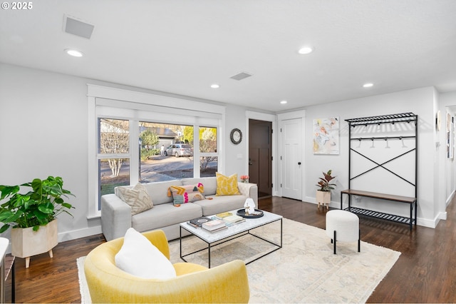 living room with dark hardwood / wood-style floors