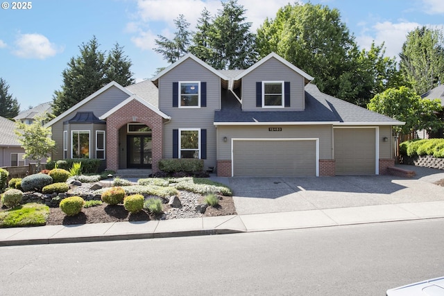 12453 SW Sheldrake Way, Beaverton, OR 97007 - view of front of house with brick siding, concrete driveway, a shingled roof, and an attached garage