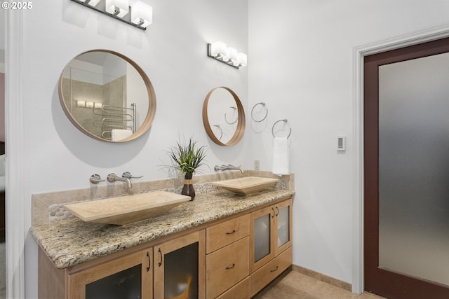 12453 SW Sheldrake Way, Beaverton, OR 97007 - full bathroom featuring double vanity and a shower