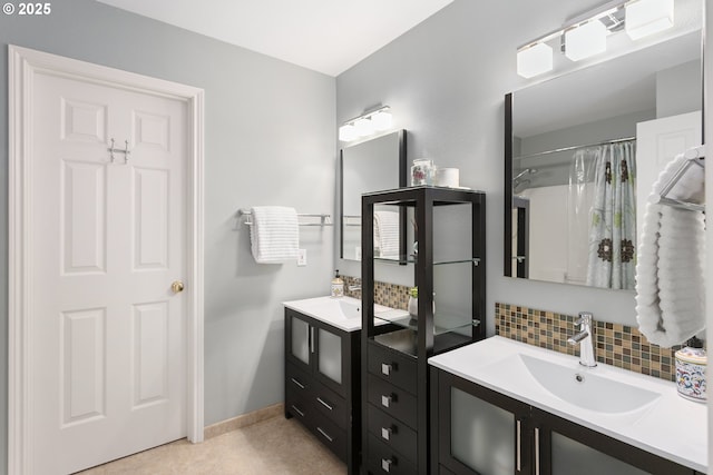 12453 SW Sheldrake Way, Beaverton, OR 97007 - bathroom featuring vanity, tasteful backsplash, and baseboards