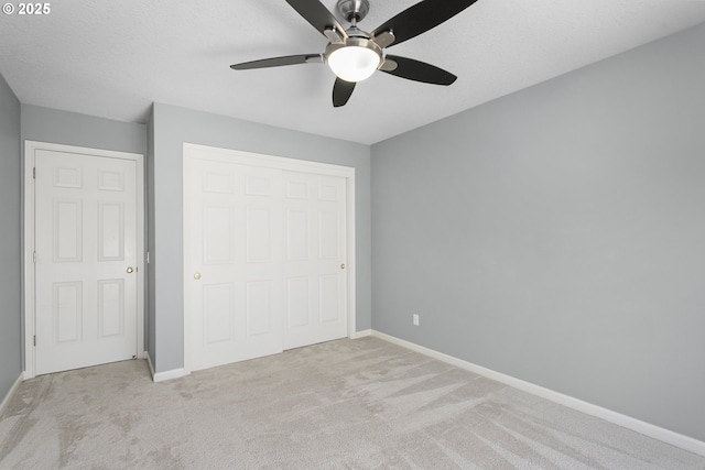 12453 SW Sheldrake Way, Beaverton, OR 97007 - empty room with light carpet, baseboards, ceiling fan, and a textured ceiling