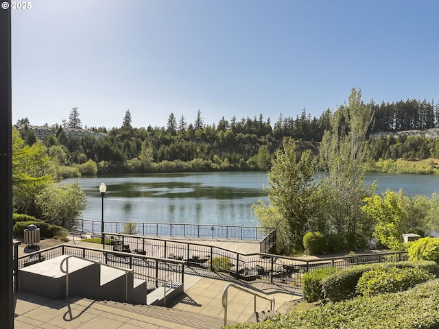 12453 SW Sheldrake Way, Beaverton, OR 97007 - water view featuring a forest
