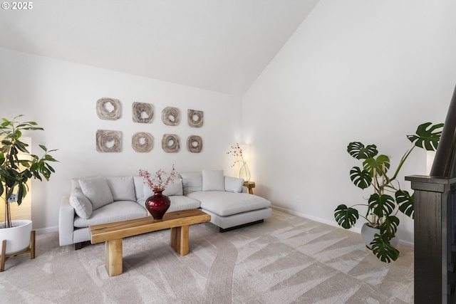 12453 SW Sheldrake Way, Beaverton, OR 97007 - carpeted living room featuring baseboards and high vaulted ceiling