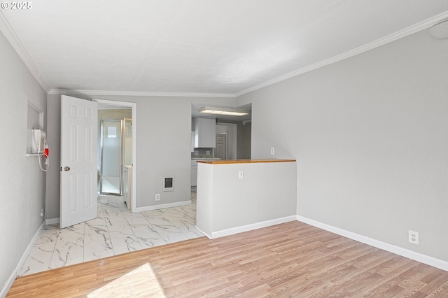 32791 E Lincoln Way, Coburg, OR 97408 - spare room featuring crown molding, light marble finish floors, and baseboards