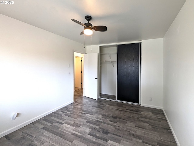 13155 SW Allen Blvd Unit 11, Beaverton, OR 97005 - unfurnished bedroom featuring a closet, dark wood-type flooring, baseboards, and ceiling fan