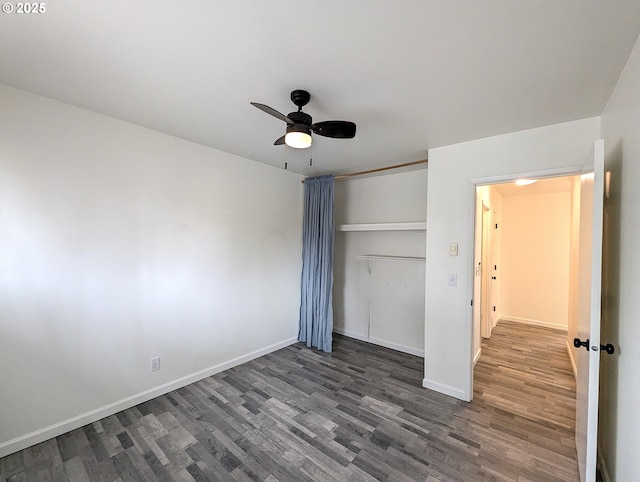 13155 SW Allen Blvd Unit 11, Beaverton, OR 97005 - unfurnished bedroom with baseboards, a closet, wood finished floors, and a ceiling fan