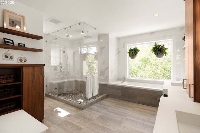9309 NW Murdock St, Portland, OR 97229 - bathroom with a stall shower, a bath, vanity, and recessed lighting