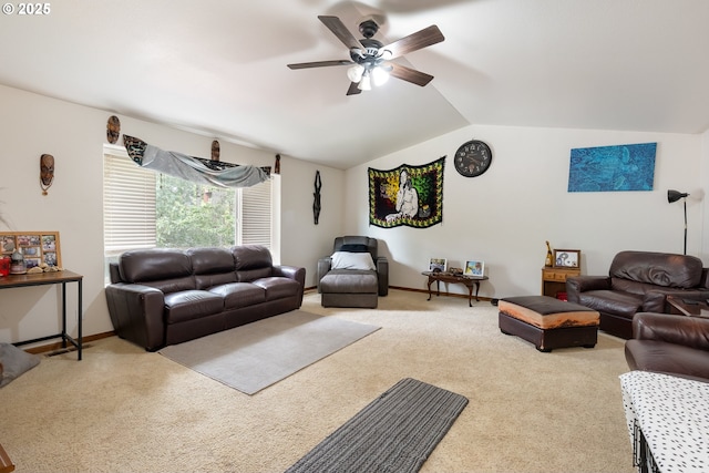 carpeted living area featuring ceiling fan, lofted ceiling, and baseboards