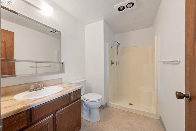 2509 E J Ct, La Grande, OR 97850 - bathroom featuring vanity, a shower, and toilet