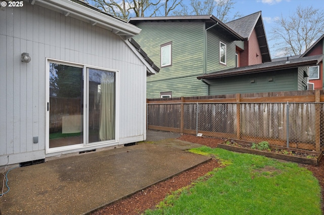 view of yard featuring visible vents, a patio, and fence