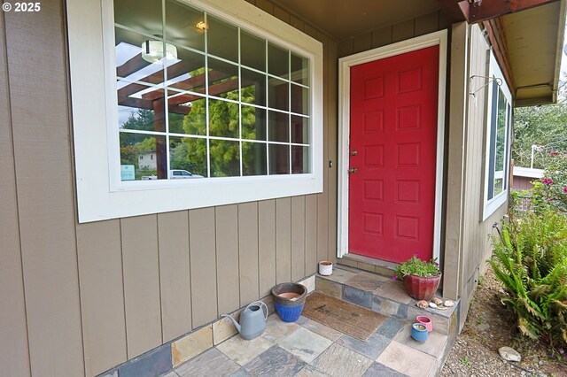650 S Cammann St, Coos Bay, OR 97420 - unfurnished living room featuring baseboards and wood finished floors