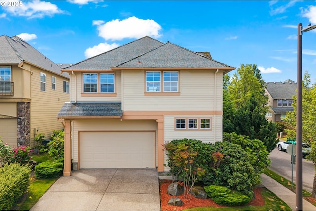 12696 NW Alsace Ln, Portland, OR 97229 - view of front of home featuring a garage and driveway