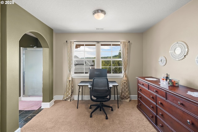 12696 NW Alsace Ln, Portland, OR 97229 - carpeted office featuring arched walkways, a textured ceiling, and baseboards