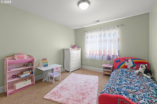 12696 NW Alsace Ln, Portland, OR 97229 - bedroom featuring carpet flooring, baseboards, and a textured ceiling