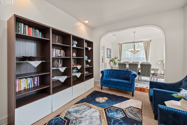 12696 NW Alsace Ln, Portland, OR 97229 - living area with arched walkways, baseboards, recessed lighting, and carpet floors