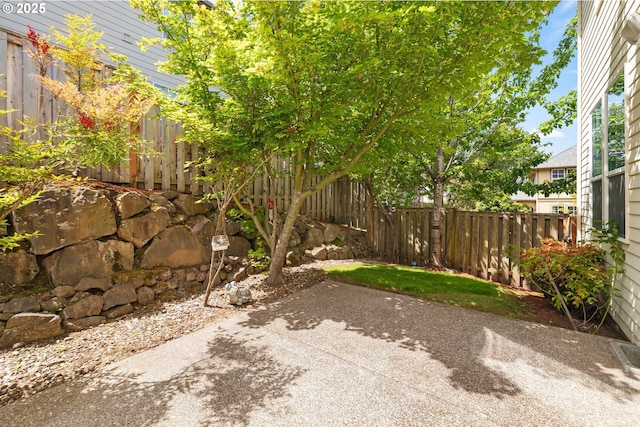12696 NW Alsace Ln, Portland, OR 97229 - fenced backyard with a patio