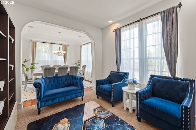 12696 NW Alsace Ln, Portland, OR 97229 - living room with a chandelier and arched walkways