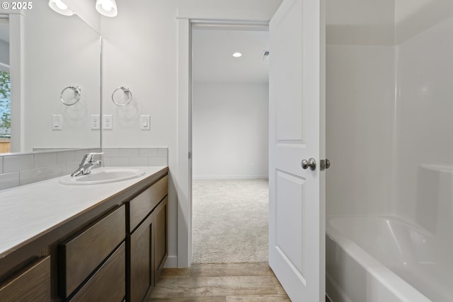 469 N 35th, Springfield, OR 97478 - bathroom with vanity, wood finished floors, and shower / tub combination