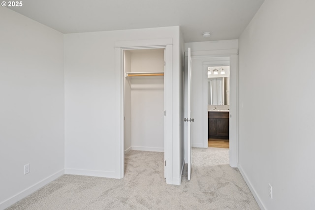 469 N 35th, Springfield, OR 97478 - unfurnished bedroom with carpet floors, a walk in closet, baseboards, and a closet